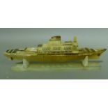 An alabaster model of a ocean liner, named the Leonardo Da Vinci, on an alabaster stand, 38cm long x