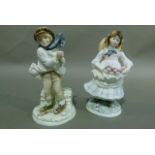 Two Coalport china figures, The Boy and Childhood Joys, issued to commemorate The National