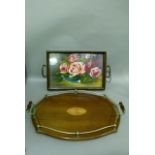 An Edwardian mahogany and EPNS galleried tray, two handled, the centre inlaid with a satinwood fan