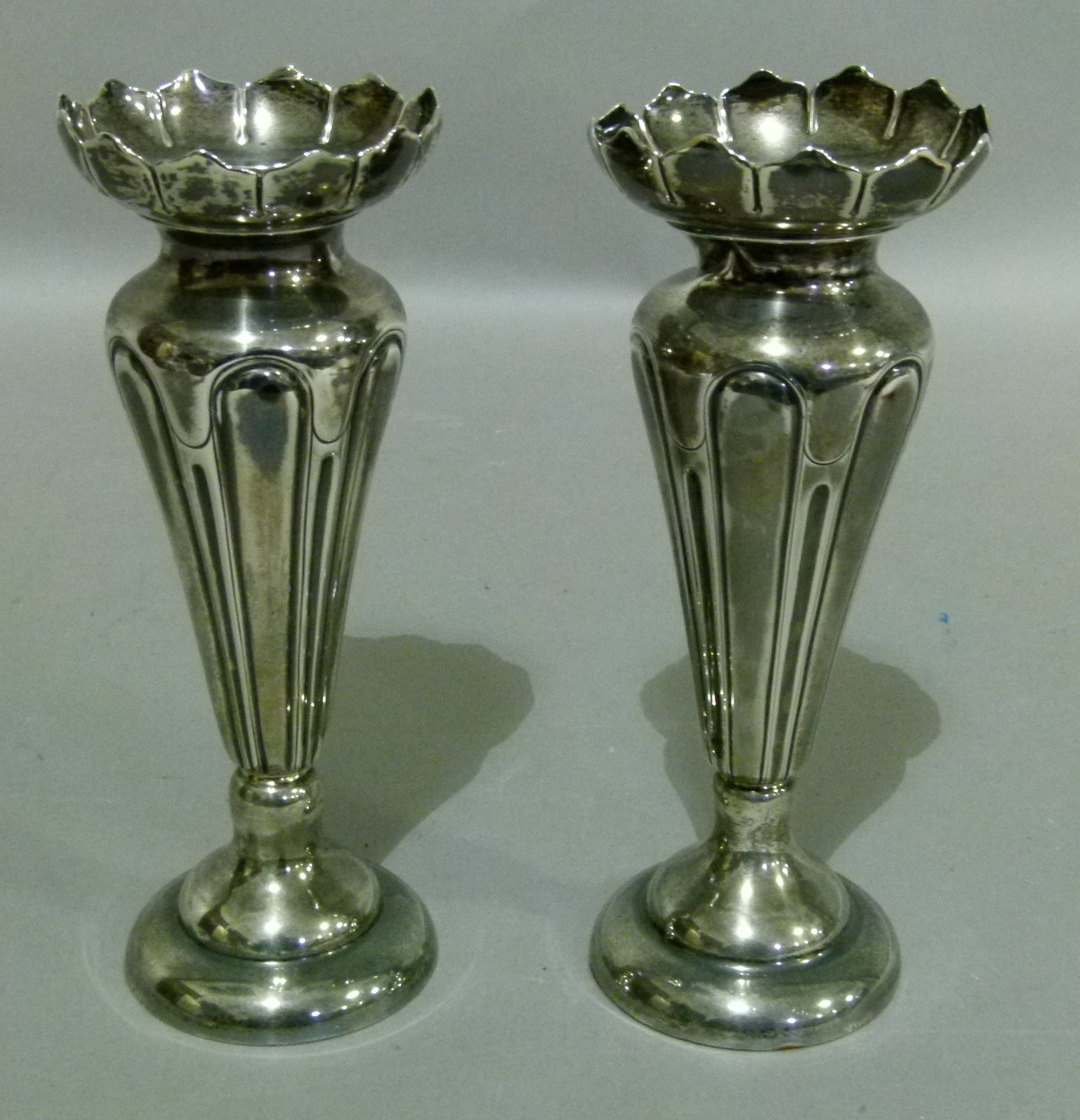 A pair of Edward VII spill vases with lappet frilled tops, the tapered panelled bodies on - Image 3 of 3