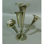 A George V silver epergne with central trumpet with frilled rim, three branches with smaller