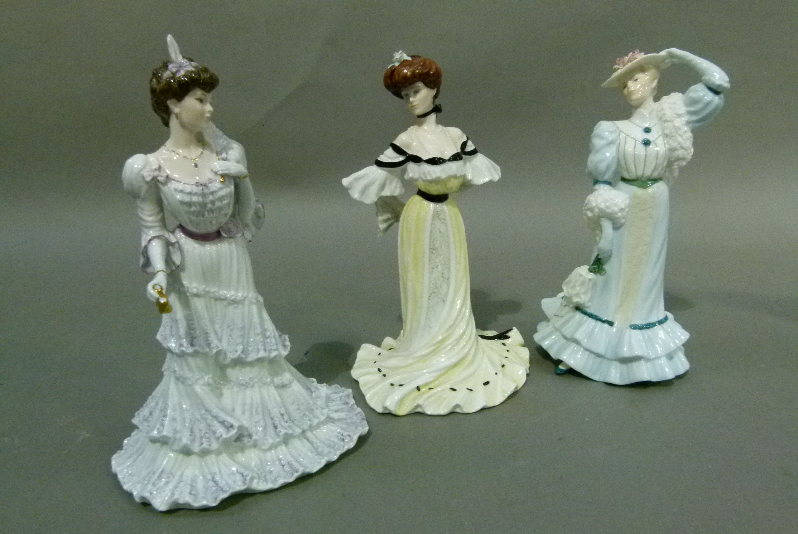 Three Coalport Golden Age china figures, Beatrice At The Garden Party, Eugine At The Opera and