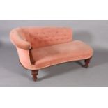 A Victorian walnut framed chaise longue with buttoned back and stuffed over seat in pink dralon on