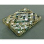 A 19th century abalone and mother-of-pearl rectangular purse, the front and back parquetry inlaid