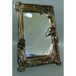 Reproduction Art Nouveau frame, the border cast with female figure reaching for a branch of flowers,