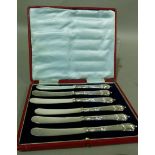 A set of six Victorian silver handled tea knives by James Deakin and Sons, Sheffield 1899, cased