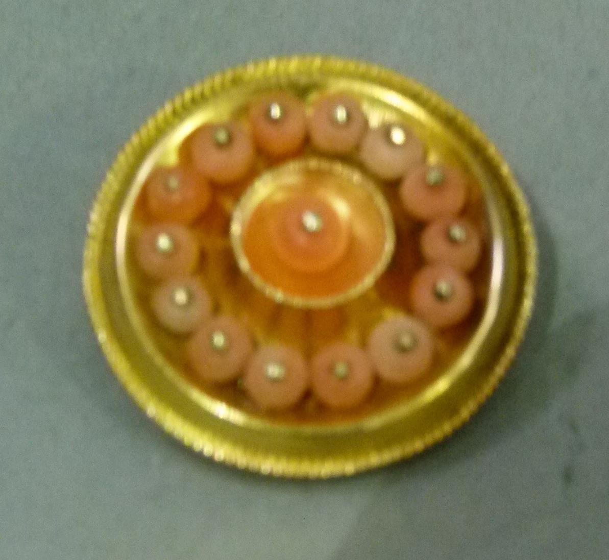 A mid-Victorian coral set shield brooch in 15ct gold, the 3mm coral beads post mounted to the centre - Image 2 of 3