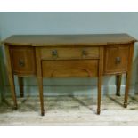 An early 20th century mahogany sideboard inlaid with satinwood banding and having three drawers to