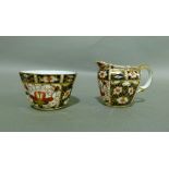 A Royal Crown Derby pattern 2451 cream jug and sugar bowl, printed mark in red, cream jug 6cm