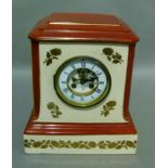 A James Macintyre and Co pottery mantel clock, the cream case with iron red top, chamfered angles