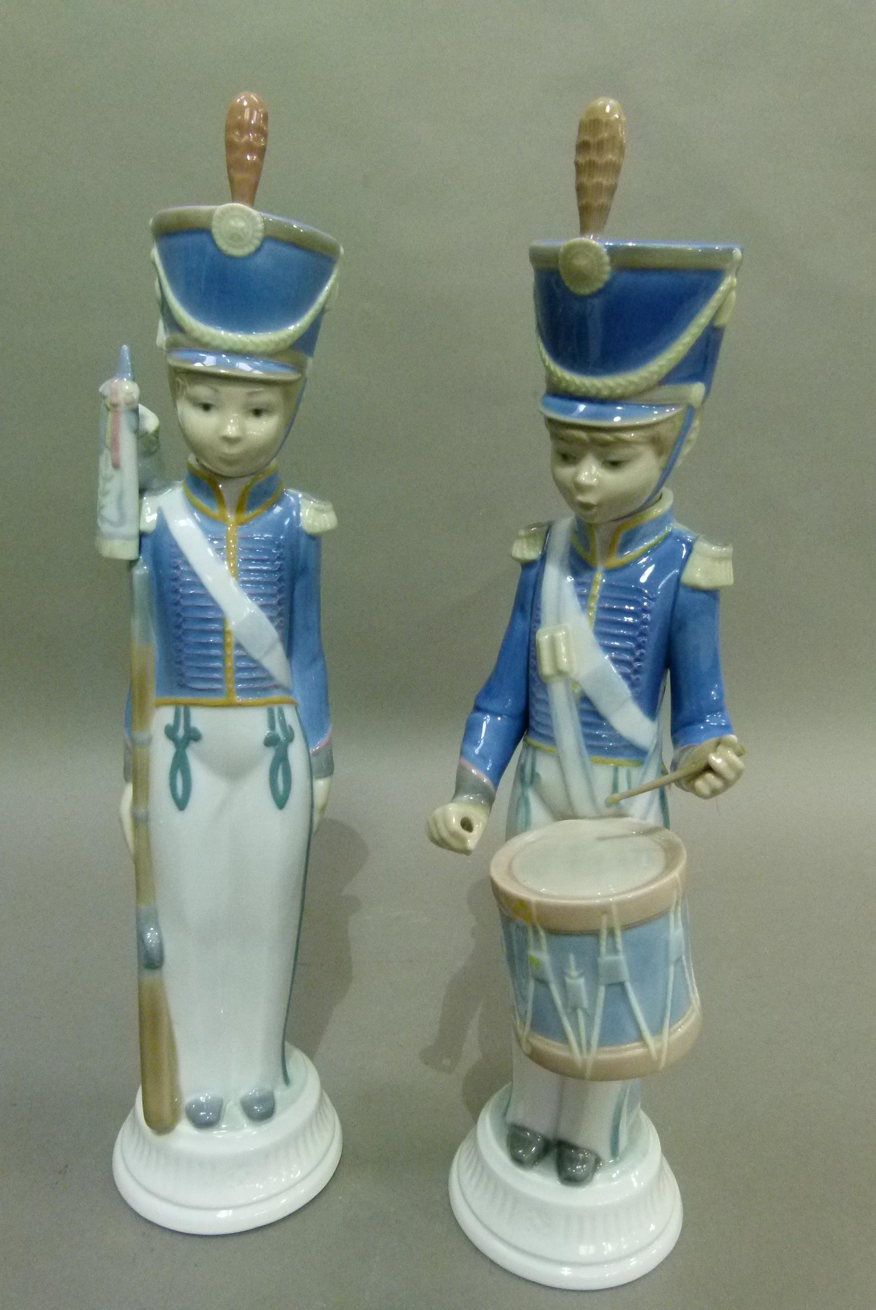 A Lladro soldier with drum, code 1167, year 1971 (one drumstick missing) together with soldier