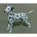 A Copenhagen porcelain model of a Dalmatian, model 3501, 16.5cm wide, printed mark in green