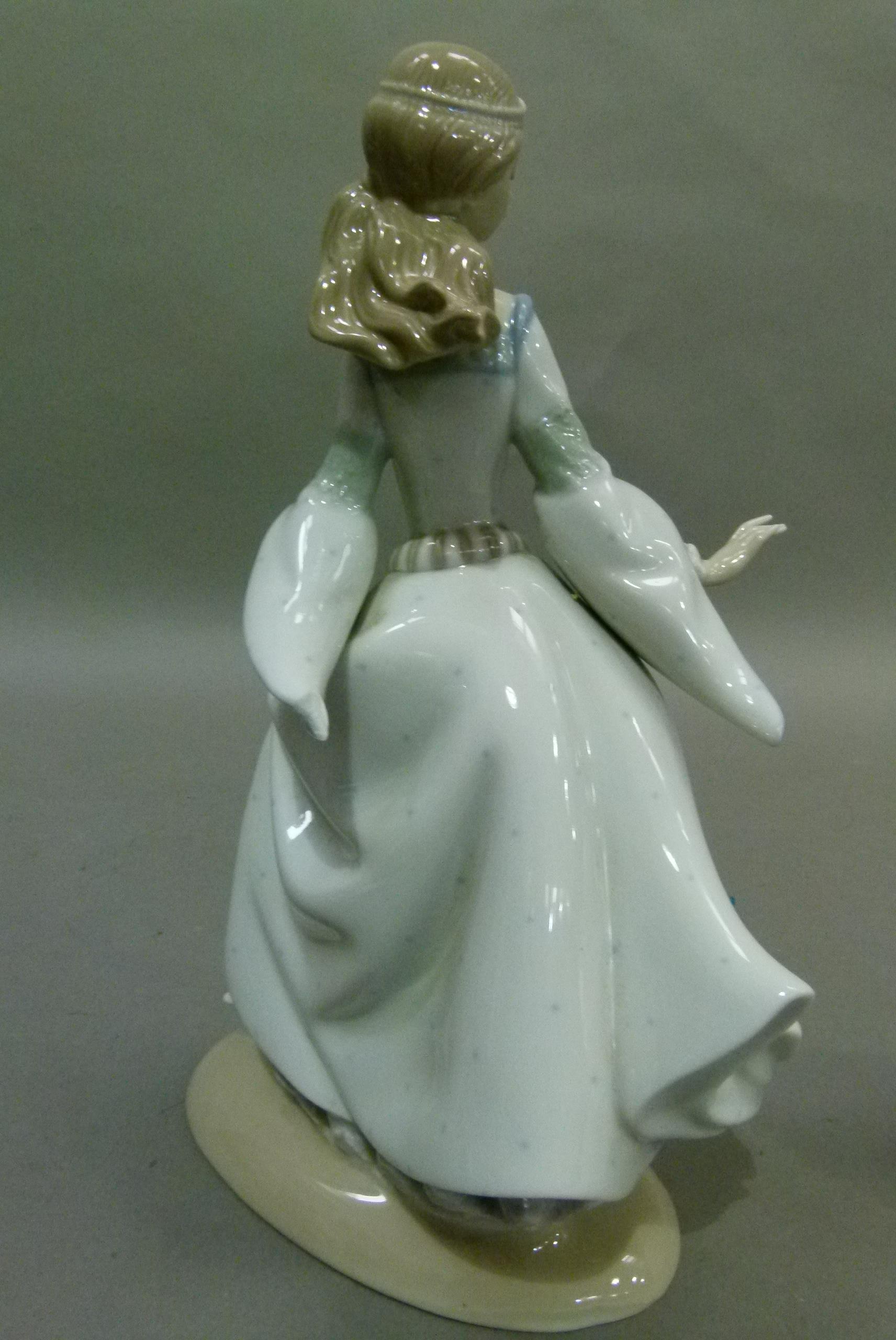 A Lladro Cinderella, code 4828, year 1972, 25cm high, (damage to cloak tip at the back) together - Image 5 of 8