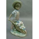 A Lladro figure Little Gardener, code 1283, year 1974, 25cm