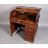 An oak Tamworth topped desk with one long drawer flanked by four drawer pedestal, panelled sides,