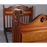 A Victorian walnut double bedstead with figured panels and railed headboard together with an