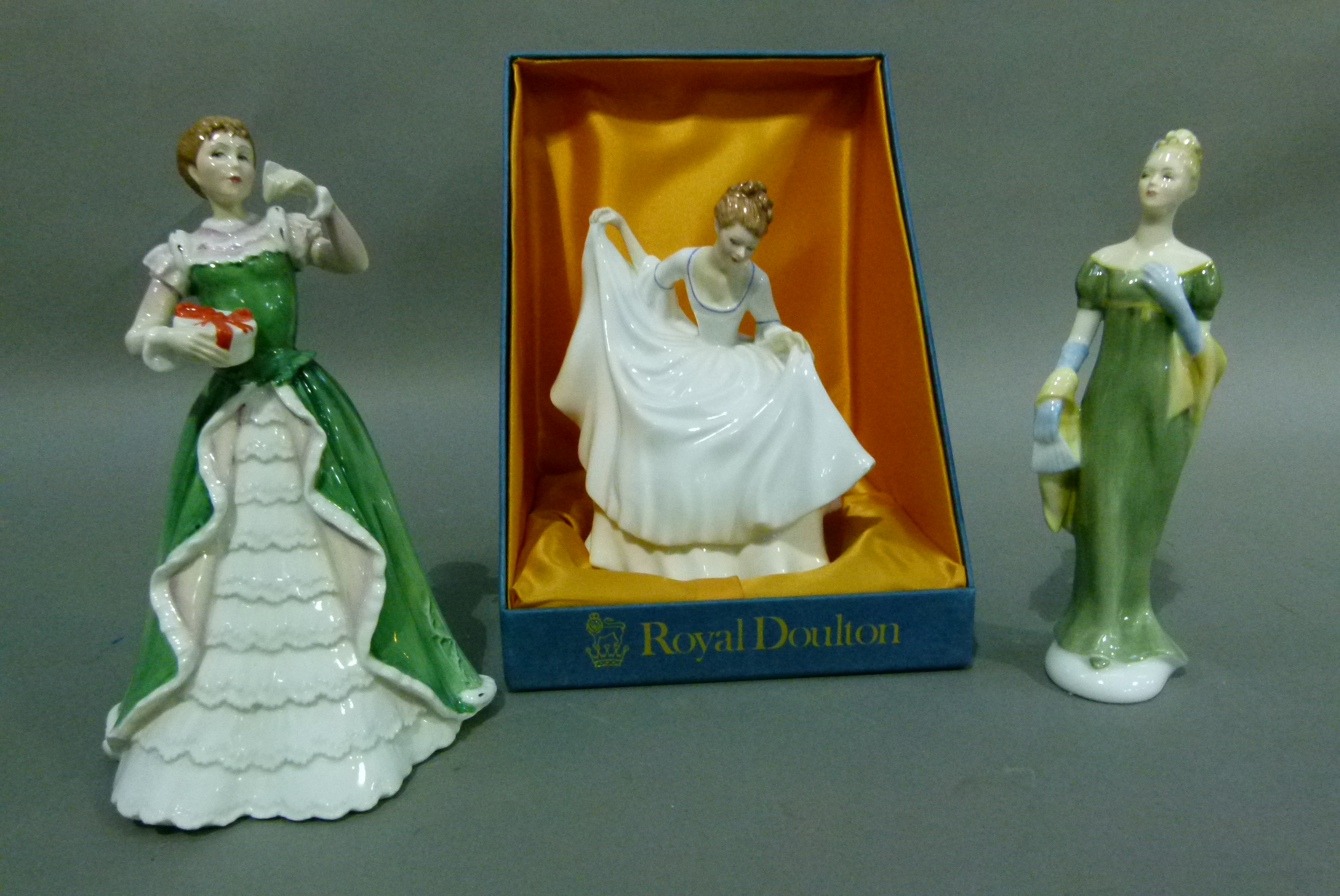 Three Royal Doulton figures, Merry Christmas, Pamela and Lorna