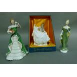 Three Royal Doulton figures, Merry Christmas, Pamela and Lorna