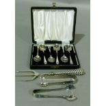 A set of six silver teaspoons with shell cast terminals by S Ltd, Birmingham 1963, cased; together