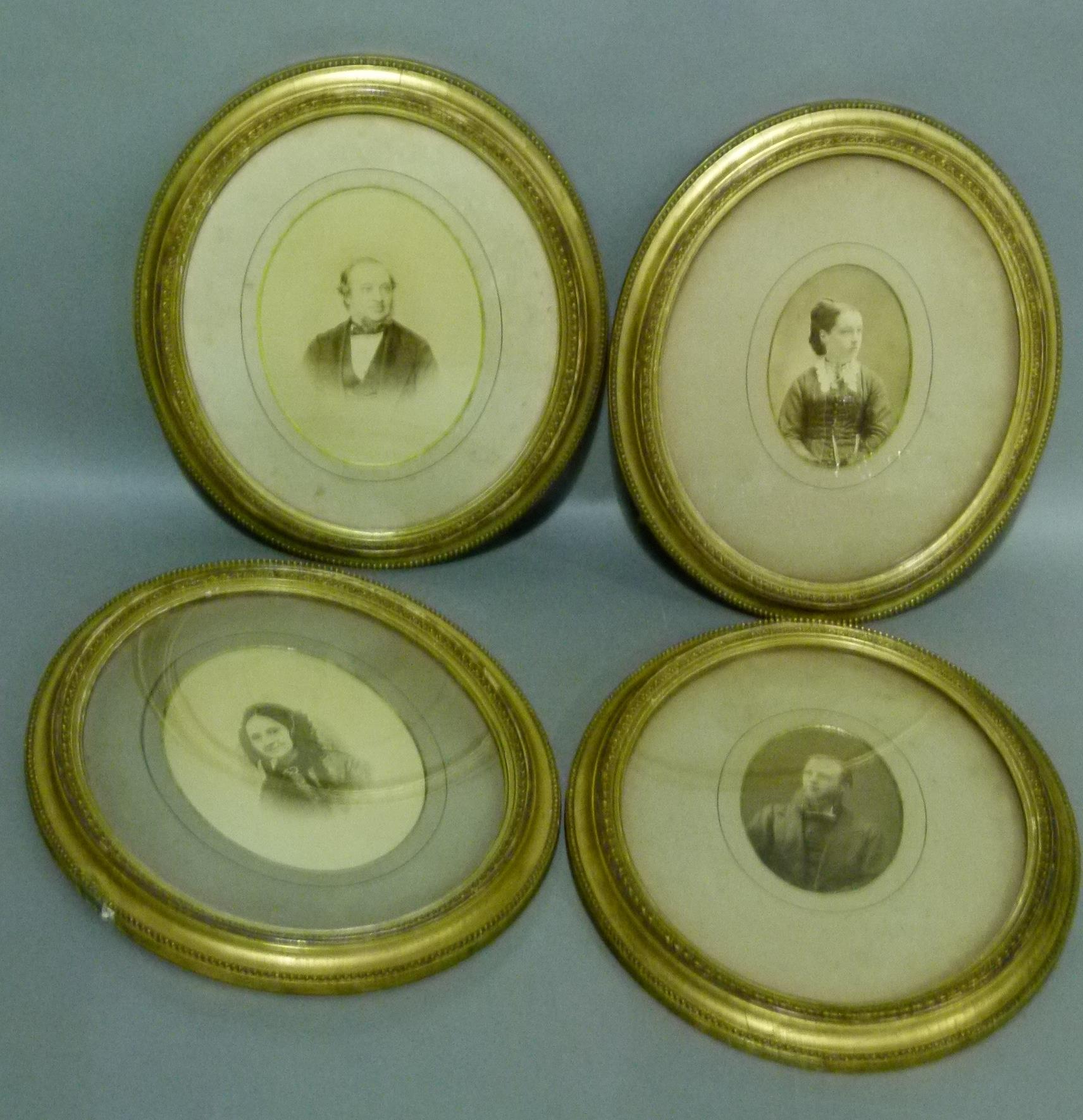 A set of four Edwardian gilt framed photographs, head and shoulder portraits within guilloche and - Image 2 of 2