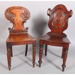 A Victorian mahogany hall chair with panelled cartouche shaped back, the serpentine bordered seat