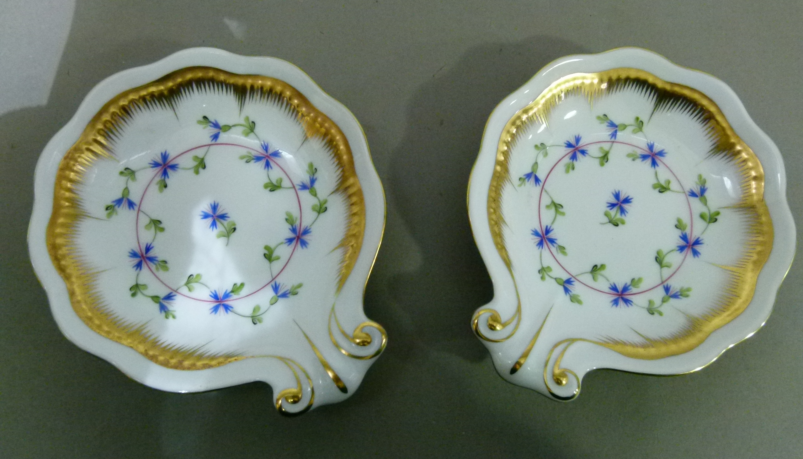 A pair of Herend shell shaped dished painted to the centres with Angouleme sprigs within a gilt - Image 2 of 3