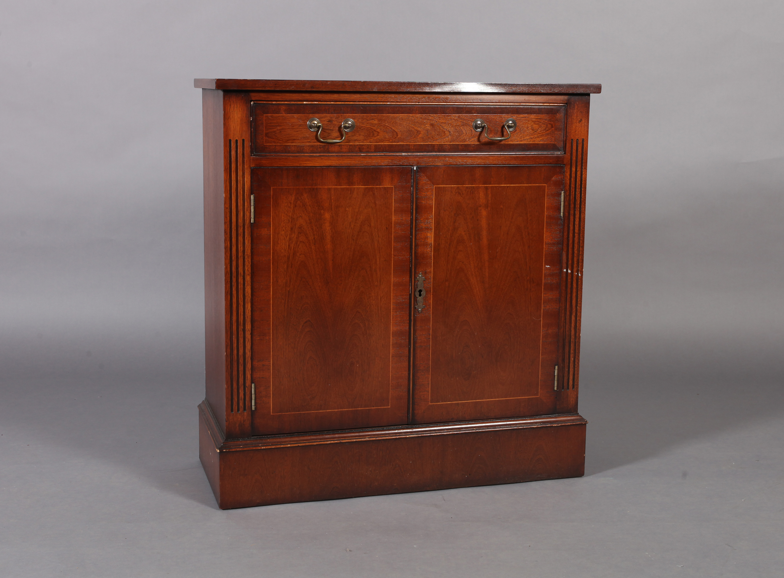 A reproduction mahogany cupboard crossbanded and box wood strung, the single frieze drawer baize - Image 2 of 4