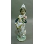 A Lladro Valencian lady, code 1304, year 1974, 24cm high