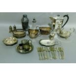 A quantity of silver plated ware including a three piece silver plated tea service, sauce boat,