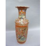 A large Chinese famille rose vase, painted and enamelled with panels of exotic birds amongst peony