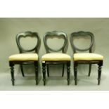 A set of three mahogany stained chairs