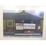 A modern japanese wood cut of a tea house signed within the plate, 27cm x 39cm