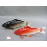 A Noritake bone china figure of a carp 13.5cm long; together with another similar, the latter with