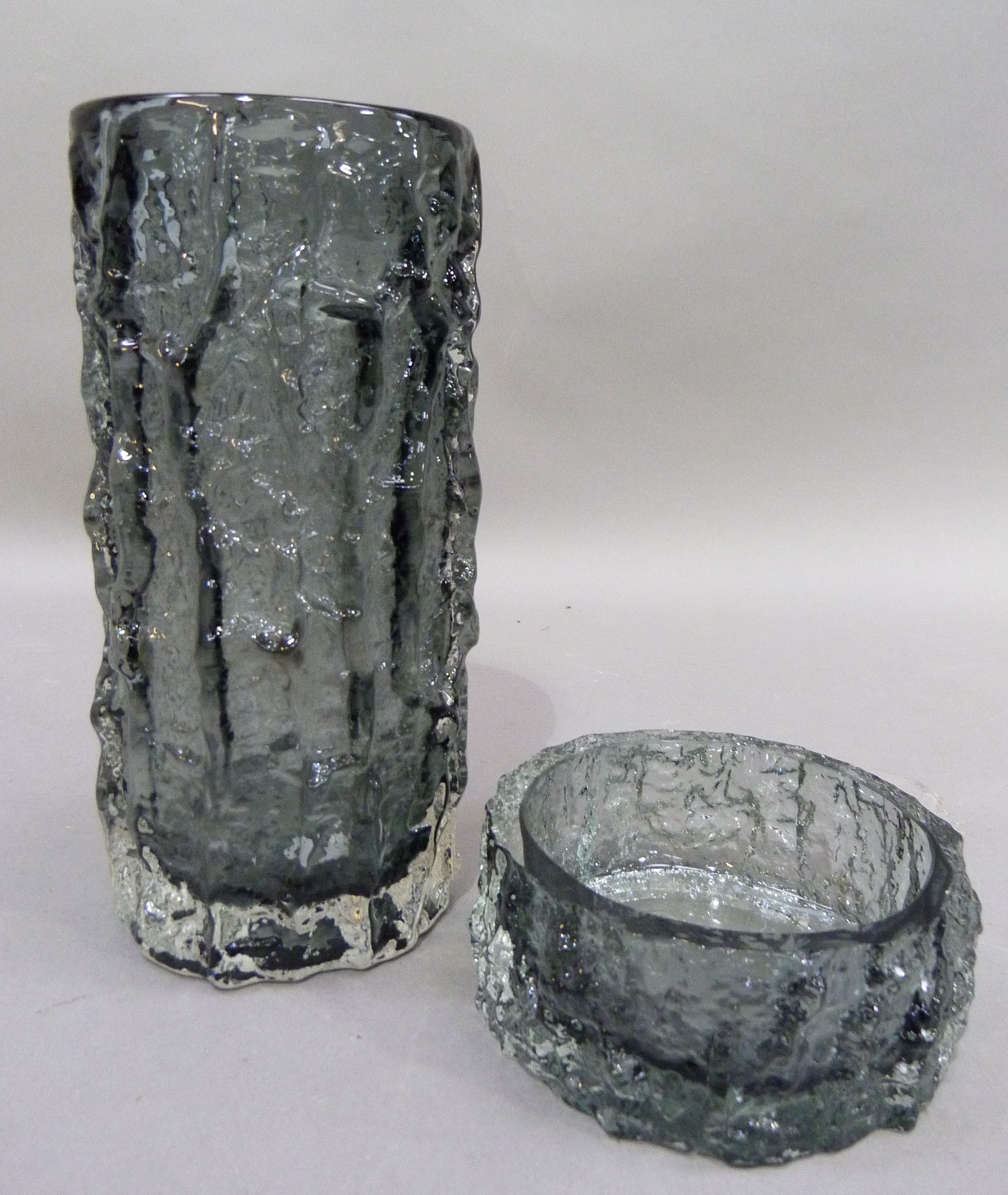 A Whitefriars, bark effect grey glass vase, cylindrical, 23cm H; together with a circular dish 5cm H