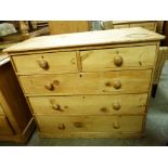 A Victorian pine chest of drawers, the rectangular top above two short and three long drawers,