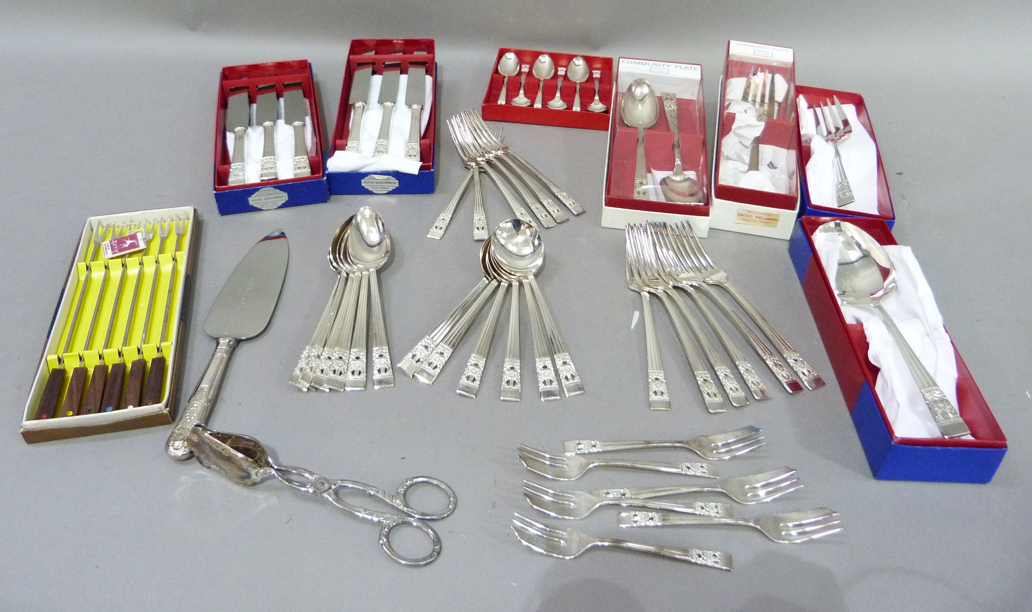 A part suite EPNS community plate cutlery in boxes comprising, six table knives, six table forks,
