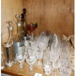 Two smoked glass decanters and five glasses, three various clear glass decanters and a quantity of