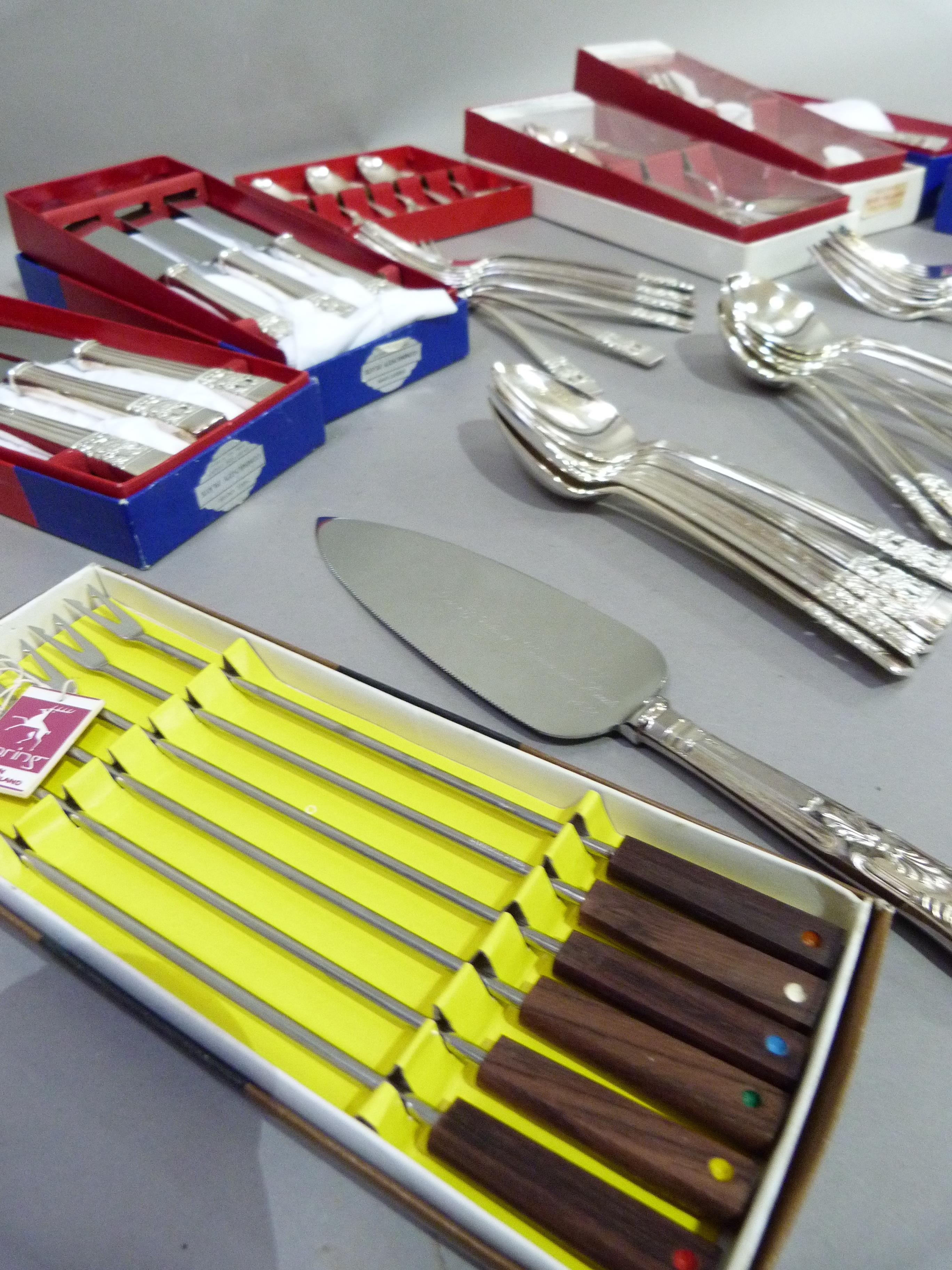 A part suite EPNS community plate cutlery in boxes comprising, six table knives, six table forks, - Image 4 of 4