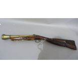 A 19th century brass barreled percussion cap blunderbuss the barrel initialled FT and D? LG to top