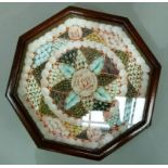 A reproduction Valentine's shell display in an octagonal glazed case with brass hanging loop,