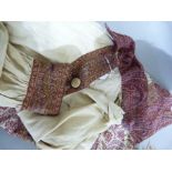 A 1920s button through dress, full length, fashioned from a 19th century paisley shawl, the beige