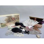 Two boxes of millinery trims, faux tortoiseshell comb, fan, bead pearls and pastes, small leather