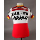 A vintage Castelli wool cycling shirt decorated to the front and shoulders with M.A.N-VW, Viking, in