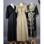 A gold lurex full length evening dress, size 42, together with a black and gold embroidered kaftan