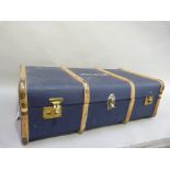 A blue trunk with wood ribbing by Overpond, with D.M. Daniels to the lid, 92cm wide x 51cm deep x