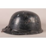 Motoring: a vintage lacquered motoring helmet with tapered brim, rubber padded internal band and a