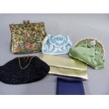 A white and pale blue beaded evening purse, boxed, together with a green satin purse with white bead