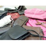 Two soft leather shoulder bags in black and in navy, small leather shoulder bag, two Tuta wallets