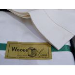 A pair of linen hemstitched sheets, double size, retailed by Woods of Harrogate, in original box, (