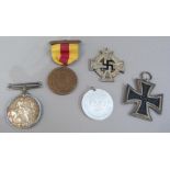 German WWII Iron Cross dated 1939, stamped 128 on ring, another German medal, British war medal to